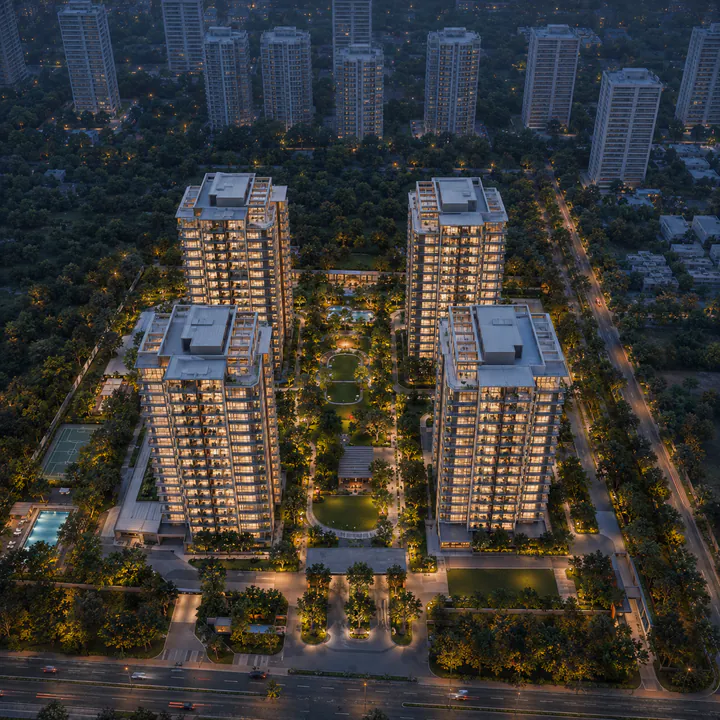 SNN Kannur Road aerial view - four Ground+16 blocks on seven acres around the central green spine